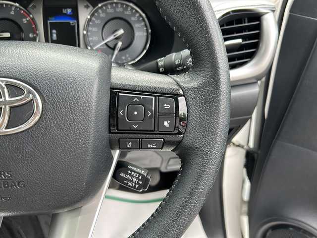 トヨタ ハイラックス Z 埼玉県 2021(令3)年 5.1万km スーパーホワイトⅡ 純正ナビ　/ＥＴＣ/リフトアップ１インチ/フロントJAOSスプリング/リアB4Lボディリフト/バグガード/社外サイド出しマフラー（5ZIGEN）/シートヒーター　/スペアキー２　/ＡＭ／ＦＭ／ＴＶ／ＢＴ／ＳＤ／ＤＶＤ　/バックカメラ　/レーンアシスト　/プッシュスタート　/レーダークルーズコントロール　/ＬＥＤヘッドライト/アイドリングストップ/保証書　/取扱説明書