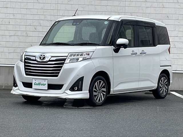 トヨタ ルーミー カスタムG 山形県 2019(令1)年 2.2万km パールホワイトⅢ スマートアシストIII/・衝突回避支援ブレーキ機能/・車線逸脱警報機能/・オートハイビーム（ＡＨＢ）/・コーナーセンサー/両側パワースライドドア/純正ナビ(CD.DVD.BT.SD)/フルセグ/バックカメラ/クルーズコントロール/純正エンジンスターター/純正ドライブレコーダー/LEDヘッドライト/プッシュスタート/スマートキー