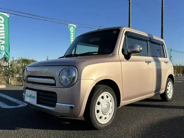 スズキ ラパン ショコラ X 宮城県 2014(平26)年 15.1万km シャンパンピンクPM 社外ナビ/ワンセグTV/バックカメラ/Bluetooth/スマートキー/純正フロアマット/レザーシート/オートライト/純正14インチ鉄ホイール