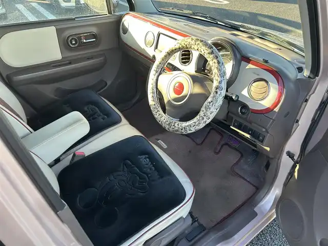 スズキ ラパン ショコラ X 宮城県 2014(平26)年 15.1万km シャンパンピンクPM 社外ナビ/ワンセグTV/バックカメラ/Bluetooth/スマートキー/純正フロアマット/レザーシート/オートライト/純正14インチ鉄ホイール