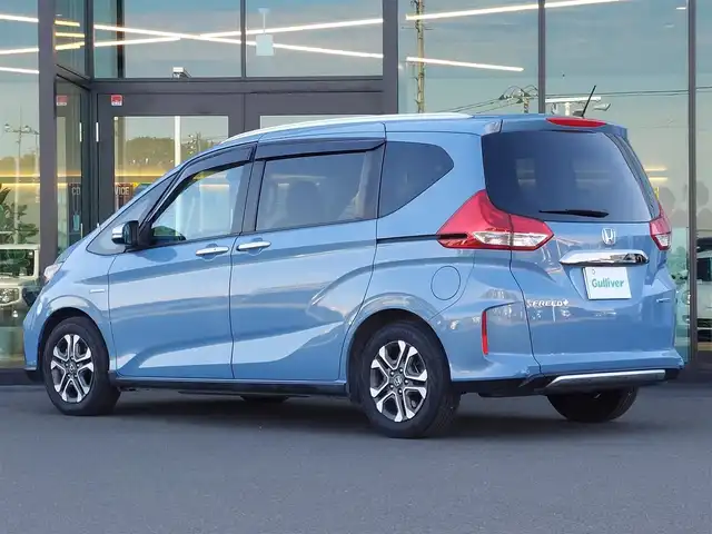 ホンダ フリード＋ ハイブリット クロスター ホンダセンシング 東京都 2022(令4)年 5.3万km シーグラスブルーパール ワンオーナー/純正ナビ(VXM-224VFi)/【DVD/CD/FM/AM/TV/ipod/SD/USB/BT/AUX】/バックカメラ/ビルトインETC/両側電動スライドドア/Cパッケージ/・シートヒーター/・ロールサンシェード/衝突軽減ブレーキ/車線逸脱警報/横滑り防止装置/バックソナー/ハーフレザーシート/LEDヘッドライト/フォグランプ/純正15インチAW/純正フロアマット/プッシュスタート/スマートキー