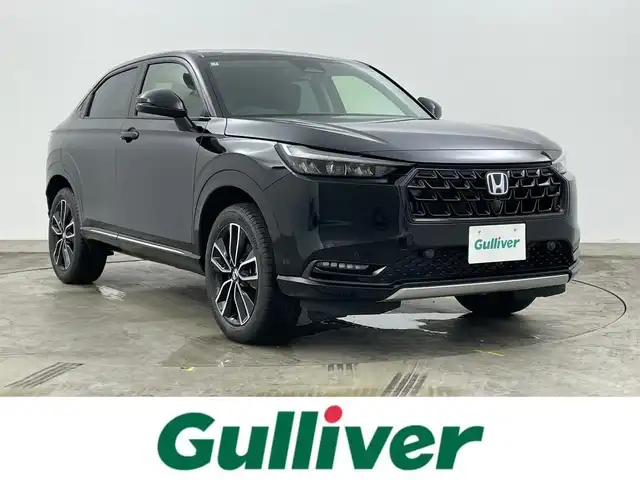 ホンダ ヴェゼル ハイブリッド e:HEV Z 岡山県 2025(令7)年 0.1千km クリスタルブラックパール 純正ディスプレイオーディオ　/【BT/フルセグ/CarPlay】/シートヒーター　/レーダークルーズコントロール　/ＬＥＤヘッドライト　/ＥＴＣ2.0/バックカメラ　/ワイヤレス充電　/ブラインドスポットモニター　/ステアリングヒーター　/電動リアゲート/オートハイビーム/コーナーセンサー/アイドリングストップ/踏み間違い防止/ステアリングスイッチ/スペアキー×1/オートエアコン