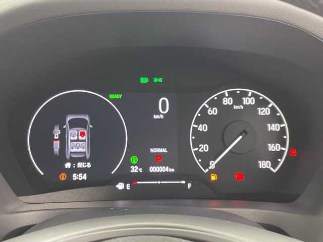 ホンダ ヴェゼル ハイブリッド e:HEV Z 愛知県 2025(令7)年 0.1千km クリスタルブラックパール 登録済未使用車　4km/純正9型ナビ/ワイヤレス充電器/ビルトインETC2.0/バックカメラ/シートヒーター/ステアリングヒーター/ホンダセンシング/・衝突軽減ブレーキ/・先行車発信お知らせ機能/・路外逸脱抑制機能/・標識認識機能/・渋滞追従機能アダプティブクルーズコントロール/・車線維持支援/・トラフィックジャムアシスト/・ブラインドスポットインフォメーション/・アダプティブドライビングビーム/ハンズフリーアクセスパワーテールゲート/後退出庫サポート/パドルシフト