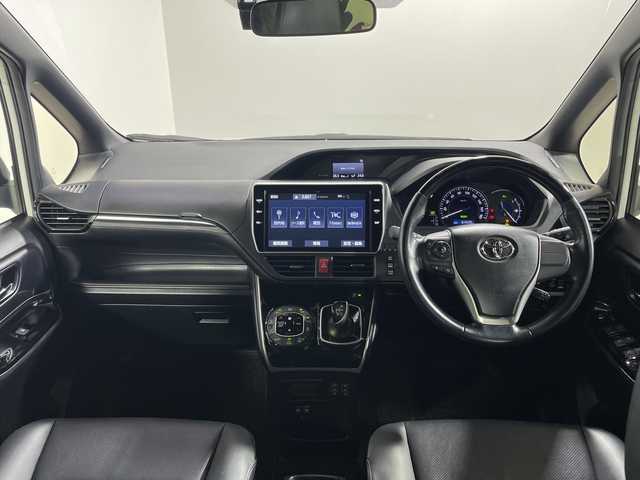 トヨタ エスクァイア ハイブリッド Gi 神奈川県 2019(平31)年 6.5万km ホワイトパールクリスタルシャイン セーフティーセンスC/純正10インチSDナビ（NSZN-Z68T）/TRDエアロ/ドライブレコーダー/両側パワースライドドア/レザーシート/シートヒーター/バックカメラ/クルーズコントロール/フリップダウンモニター/レザーシート/ETC/アイドリングストップ/LEDヘッドライト/フォグランプ/オートライト/ウィンカーミラー/電動格納ミラー/純正15インチAW/プッシュスタート/スマートキー/フロアマット