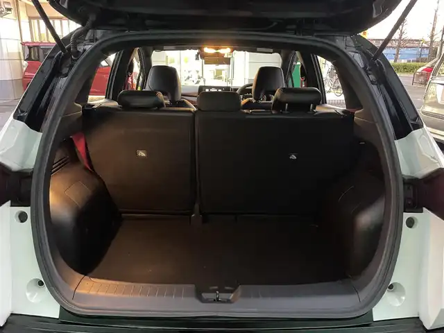 日産 オーラ ニスモ 東京都 2022(令4)年 1.2万km ピュアホワイトパール / スーパーブラック 2トーン ワンオーナー/ブラックルーフ/コネクトナビゲーションシステム/・9インチメモリナビ/（フルセグTV//DVD/Bluetooth/USB//android auto/applecarplay)/・ワイヤレス充電器/・ETC2.0/・プロパイロット/・前席USB電源ソケットタイプC/寒冷地仕様/・ドアミラーヒーター/・革巻きステアリング/・ステアリングヒーター/・シートヒーター(運転席＆助手席)/純正ドライブレコーダー（DH5-S)/全方位運転支援システム/・インテリジェントエマージェンシーブレーキ/・車線逸脱警報/・車線逸脱防止支援システム/・高速方衝突防止支援システム/インテリジェントアラウンドビューモニター/アダプティブLEDヘッドランプ/前後コーナーセンサー/社外ホイール＋スタッドレスタイヤ車載/保証書/取扱説明書/記録簿