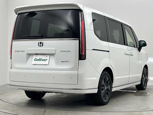 ホンダ ステップワゴン スパーダ eHEV 大阪府 2025(令7)年 0.1千km プラチナホワイトパール 純正11.4インチナビHonda CONNECTナビ /・フルセグTV/・Bluetooth/・CD/DVD/・USB接続/・SDミュージックサーバー/Honnda SENSING/・衝突軽減ブレーキ/・誤発進抑制機能/・歩行者事故低減ステアリング/・路外逸脱抑制機能/・アダプティブクルーズコントロール/・車線維持支援システム/・トラフィックジャムアシスト/・先行車発進お知らせ機能/・標識認識機能/・オートハイビーム/・アダプティブドライビングビーム/・パーキングセンサーシステム/・急アクセル抑制機能/・ブラインドスポットインフォメーション/パワーバックドア/両側パワースライドドア/バックカメラ/2列目オットマン/シートヒーター/LEDヘッドライト/ステアリングスイッチ