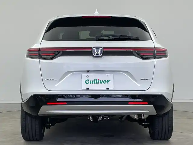 ホンダ ヴェゼル ハイブリッド e:HEV Z 新潟県 2025(令7)年 0.1千km プラチナホワイトパール 4WD/純正メモリナビ/フルセグTV/Bluetooth/AppleCarPlay/AndroidAuto/ホンダセンシング/・衝突被害軽減ブレーキ/・先行車発進お知らせ機能/・歩行者事故低減ステアリング/・路外逸脱抑制機能/・標識認識機能/・渋滞追従機能付アダプティブクルーズコントロール/・車線維持支援システム/・誤発進抑制機能/・トラフィックジャムアシスト(渋滞運転支援機能)/・ブラインドスポットインフォメーション/・後方誤発進抑制機能/・近距離衝突軽減ブレーキ/・急アクセル抑制機能/・パーキングセンサーシステム/・後退出庫サポート/・オートハイビーム/・アダプティブドライビングビーム/ハーフレザーシート/前席シートヒーター/バックモニター/ワイヤレス充電/ステアリングヒーター/パドルシフト/レザーステアリング/ステアリングスイッチ/禁煙車