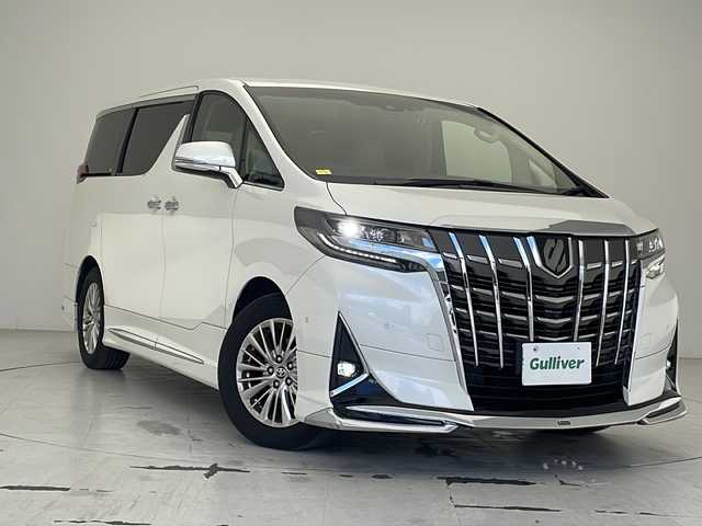 トヨタ アルファード G 沖縄県 2021(令3)年 7.1万km ホワイトパールクリスタルシャイン ワンオーナー/10．5型ナビ＋JBLプレミアムサウンド（MOP)/　（BT/DVD/CD/SD/AM/FM/USB/フルセグTV）/パノラミックビューモニター（MOP)/13.3型リアエンターテインメントシステム（MOP)/モデリスタエアロ（F・S・R）/デジタルインナーミラー（MOP)/両側パワースライドドア/パワーバックドア/ビルトインETC2.0/前後ドライブレコーダー（ZDR016）/トヨタセーフティセンス/ブラインドスポットモニター（MOP)/インテリジェントパーキングアシスト（MOP)/合皮シート/前席パワーシート/前席シートヒーター/前席シートエアコン/3眼LEDヘッドライト/オートライト/アクセサリーコンセント（AC100V)/置くだけ充電/純正17インチAW/純正フロアマット/プッシュスタート/スマートキ―/記録簿/取扱説明書/保証書