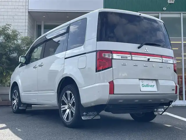 三菱 デリカＤ：５ P 岡山県 2021(令3)年 4.6万km ウォームホワイトパール 純正10.5インチナビ/フルセグTV、Bluetooth、HDMI、USB、AM、FM/純正11.5インチフリップダウンモニター/パワーバックドア/運転席パワーシート/前席シートヒーター/ステアリングヒーター/全方位カメラ/両側パワースライドドア/ETC/パドルシフト/JAOSマッドガード/パートタイム4WD/マルチLEDヘッドライト/電動パーキングブレーキ/後側方車両検知警報システム/後退時交差車両検知警報システム/三菱e-Assist/・車線逸脱警報システム/・レーダークルーズコントロール/・衝突被害軽減システム/・オートマチックハイビーム/・誤発進抑制機能