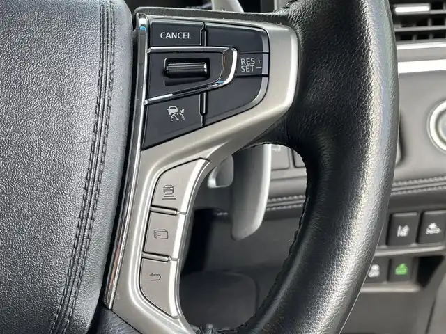 三菱 デリカＤ：５ P 岡山県 2021(令3)年 4.6万km ウォームホワイトパール 純正10.5インチナビ/フルセグTV、Bluetooth、HDMI、USB、AM、FM/純正11.5インチフリップダウンモニター/パワーバックドア/運転席パワーシート/前席シートヒーター/ステアリングヒーター/全方位カメラ/両側パワースライドドア/ETC/パドルシフト/JAOSマッドガード/パートタイム4WD/マルチLEDヘッドライト/電動パーキングブレーキ/後側方車両検知警報システム/後退時交差車両検知警報システム/三菱e-Assist/・車線逸脱警報システム/・レーダークルーズコントロール/・衝突被害軽減システム/・オートマチックハイビーム/・誤発進抑制機能