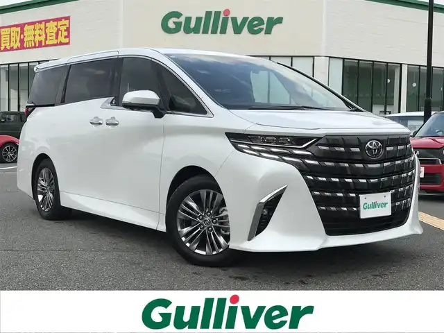 トヨタ アルファード Z 鳥取県 2024(令6)年 2.6万km プラチナホワイトパールマイカ ４・W・D/ワンオーナー/純正14インチコネクティッドナビ/フルセグ/BT/Miracast/パノラミックビューモニターモニター/ETC2.0・前後ドライブレコーダー/左右独立ムーンルーフ/トヨタセーフティセンス/ブラインドスポットモニター/ヘッドアップディスプレイ/ユニバーサルステップ/両側パワースライドドア/パワーバックドア/デジタルインナーミラー/タイプC接続　　/合皮レザーシート/前席パワーシート/運転席メモリーシート/前後席シートヒーター/エアシート/三眼LEDヘットライト/純正18インチアルミホイール/プッシュエンジンスタート/スペアキー