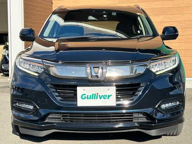ホンダ ヴェゼル ハイブリッド Z ホンダセンシング 静岡県 2018(平30)年 8.9万km ミッドナイトブルービームM 純正8インチナビ[VXM-187VFEi]/（フルセグTV/ＣＤ/ＤＶＤ/Ｂｌｕｅｔｏｏｔｈ/AppleCarPlay）/ホンダセンシング/・衝突被害軽減ブレーキ/・車線逸脱警報機能/・アダプティブクルーズコントロール/バックカメラ/純正前後ドライブレコーダー/ビルトインＥＴＣ/ハーフレザーシート/シートヒーター/ステアリングスイッチ/LEDヘッドライト/純正アルミホイール/スマートキー×２/保証書/取扱説明書
