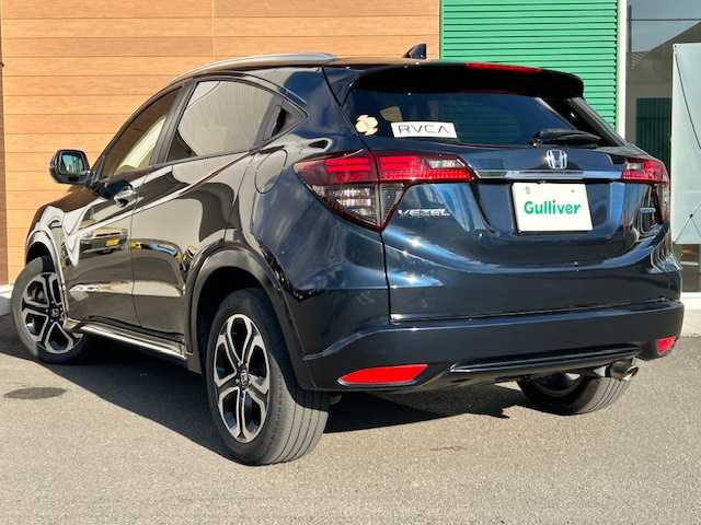 ホンダ ヴェゼル ハイブリッド Z ホンダセンシング 静岡県 2018(平30)年 8.9万km ミッドナイトブルービームM 純正8インチナビ[VXM-187VFEi]/（フルセグTV/ＣＤ/ＤＶＤ/Ｂｌｕｅｔｏｏｔｈ/AppleCarPlay）/ホンダセンシング/・衝突被害軽減ブレーキ/・車線逸脱警報機能/・アダプティブクルーズコントロール/バックカメラ/純正前後ドライブレコーダー/ビルトインＥＴＣ/ハーフレザーシート/シートヒーター/ステアリングスイッチ/LEDヘッドライト/純正アルミホイール/スマートキー×２/保証書/取扱説明書