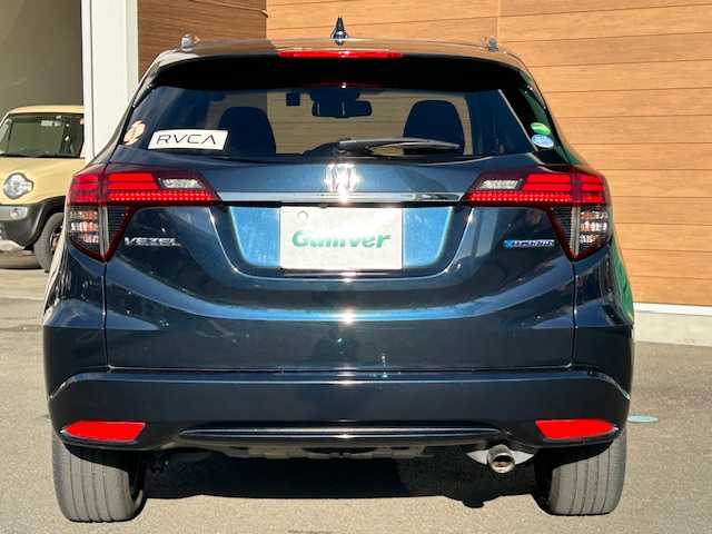 ホンダ ヴェゼル ハイブリッド Z ホンダセンシング 静岡県 2018(平30)年 8.9万km ミッドナイトブルービームM 純正8インチナビ[VXM-187VFEi]/（フルセグTV/ＣＤ/ＤＶＤ/Ｂｌｕｅｔｏｏｔｈ/AppleCarPlay）/ホンダセンシング/・衝突被害軽減ブレーキ/・車線逸脱警報機能/・アダプティブクルーズコントロール/バックカメラ/純正前後ドライブレコーダー/ビルトインＥＴＣ/ハーフレザーシート/シートヒーター/ステアリングスイッチ/LEDヘッドライト/純正アルミホイール/スマートキー×２/保証書/取扱説明書