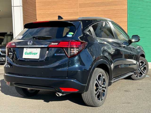 ホンダ ヴェゼル ハイブリッド Z ホンダセンシング 静岡県 2018(平30)年 8.9万km ミッドナイトブルービームM 純正8インチナビ[VXM-187VFEi]/（フルセグTV/ＣＤ/ＤＶＤ/Ｂｌｕｅｔｏｏｔｈ/AppleCarPlay）/ホンダセンシング/・衝突被害軽減ブレーキ/・車線逸脱警報機能/・アダプティブクルーズコントロール/バックカメラ/純正前後ドライブレコーダー/ビルトインＥＴＣ/ハーフレザーシート/シートヒーター/ステアリングスイッチ/LEDヘッドライト/純正アルミホイール/スマートキー×２/保証書/取扱説明書