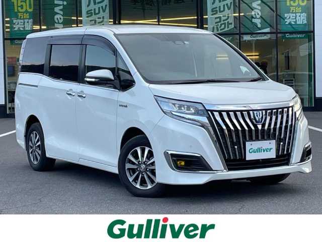 トヨタ エスクァイア ハイブリッド Gi プレミアムパッケージ 岡山県 2019(令1)年 7.6万km ホワイトパールクリスタルシャイン 登録時走行距離75234km/ALPINE１１インチナビ/フルセグTV(AM/FM/CD/DVD/Bluetooth)/バックカメラ/両側パワースライドドア/ドライブレコーダー/レーダー探知機/ビルトインETC/トヨタセーフティセンス/・クルーズコントロール/・オートマチックハイビーム/・プリクラッシュセーフティ/・レーンディバーチャーアラート/D/N席シートヒーター/ステアリングヒーター/１５インチ純正AW/フロアマット
