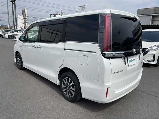 トヨタ エスクァイア ハイブリッド Gi プレミアムパッケージ 岡山県 2019(令1)年 7.6万km ホワイトパールクリスタルシャイン 登録時走行距離75234km/ALPINE１１インチナビ/フルセグTV(AM/FM/CD/DVD/Bluetooth)/バックカメラ/両側パワースライドドア/ドライブレコーダー/レーダー探知機/ビルトインETC/トヨタセーフティセンス/・クルーズコントロール/・オートマチックハイビーム/・プリクラッシュセーフティ/・レーンディバーチャーアラート/D/N席シートヒーター/ステアリングヒーター/１５インチ純正AW/フロアマット