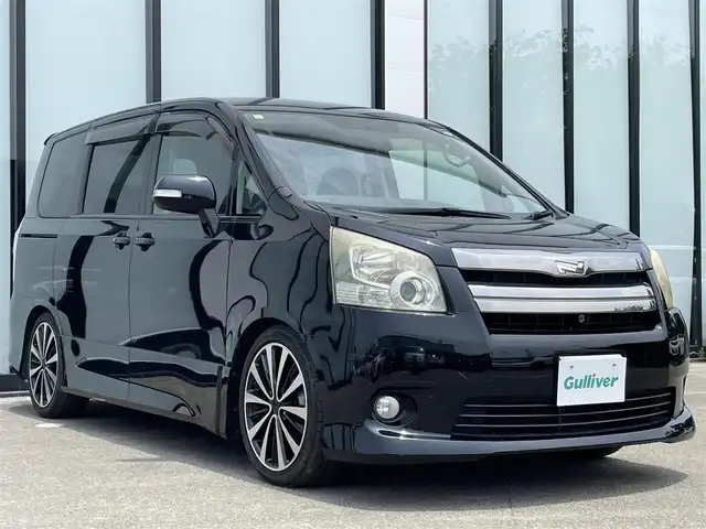 トヨタ ノア Si 大阪府 2009(平21)年 7.4万km ブラック 純正ナビ/   フルセグTV/CD/DVD/Bluetooth/USB/100V電源/バックモニター/９インチ後席モニター/コーナーセンサー/横滑り防止装置/柿本マフラー/BEO resolutionアルミホイール/両側パワースライドドア/ステアリングスイッチ/純正フロアマット/プッシュスタート/スマートキー/ＥＴＣ