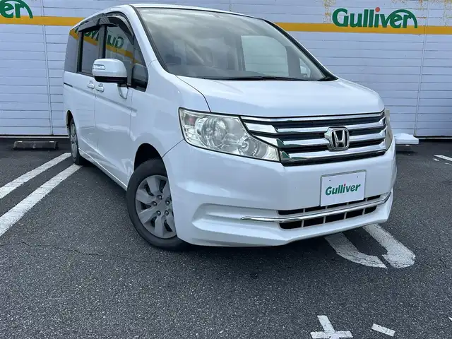 ホンダ ステップワゴン G 埼玉県 2012(平24)年 6.7万km ホワイトオーキッドパール 登録走行距離66580km/ワンセグテレビ/バックカメラ/アイドリングストップ/ドアバイザー/両側スライドドア/ETC/ABS/横滑り防止/ベンチシート/メモリナビ