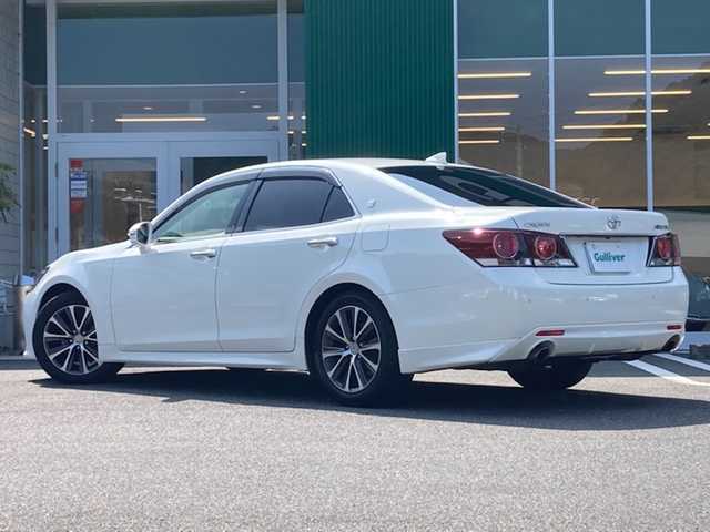 トヨタ クラウン アスリート S-T 愛媛県 2015(平27)年 8.9万km ホワイトパールクリスタルシャイン メーカーオプションナビ /・CD/DVD/Blu-ray/フルセグTV /・Bluetooth/MSV/USB/AUX /全方位モニター/・フロントカメラ/・バックカメラ /前方ドライブレコーダー /ビルトインETC /革シート /・D/N席パワーシート /・D/N席シートヒーター /・D/N席エアーシート/クルーズコントロール/パドルシフト/コーナーセンサー/純正アルミホイール/アイドリングストップ/クラウンロゴカーテシーランプ/LEDオートライト/・フォグランプ/プッシュスタート/電動格納ミラー/・ウィンカーミラー /取扱説明書/保証書