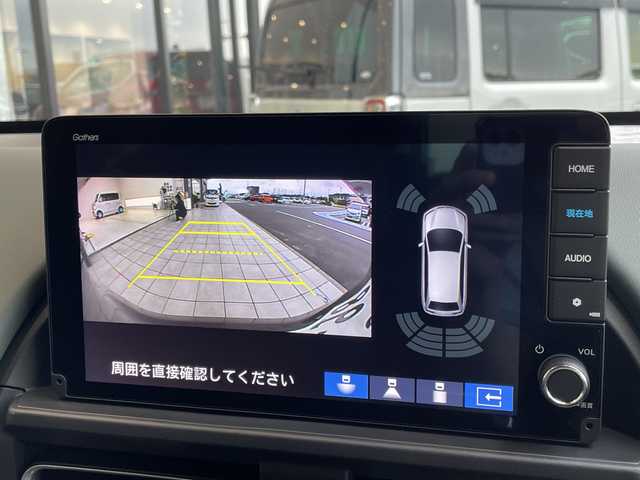 ホンダ フリード ハイブリット e:HEV クロスター 愛知県 2025(令7)年 0.1千km クリスタルブラックパール 登録済未使用車/純正9型ディズプレイオーディオナビ/両側パワースライドドア/レーダークルーズコントロール/シートヒーター/バックカメラ/コーナーセンサー/純正アルミホイール/ルーフレール/ブラインドスポットモニター/LEDヘッドライト/レーンキープアシスト/オートマチックハイビーム/衝突軽減システム/フルセグ/Bluetooth/ステアリングスイッチ/スマートキー/プッシュスタート