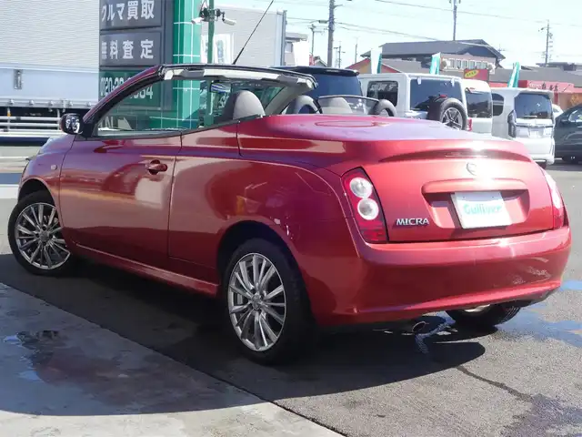 日産 マイクラ Ｃ＋Ｃ 静岡県 2007(平19)年 10.5万km ワインＭ マーチマイクラコンバーチブル/電動オープン/スタイリッシュガラスルーフ/自店管理ユーザー買取車両/車検令和9年5月まで/禁煙車/HIDヘッドライト/純正CDチューナー/ETC/革巻きステアリング/フロントフォグランプ/社外16インチアルミ/イモビライザー/保証書