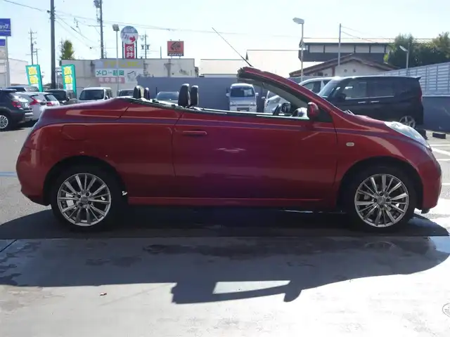 日産 マイクラ Ｃ＋Ｃ 静岡県 2007(平19)年 10.5万km ワインＭ マーチマイクラコンバーチブル/電動オープン/スタイリッシュガラスルーフ/自店管理ユーザー買取車両/車検令和9年5月まで/禁煙車/HIDヘッドライト/純正CDチューナー/ETC/革巻きステアリング/フロントフォグランプ/社外16インチアルミ/イモビライザー/保証書