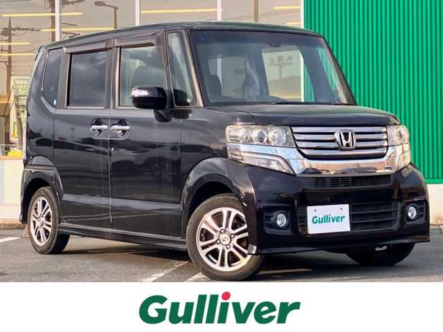 ホンダ Ｎ ＢＯＸ カスタム G SSパッケージ 静岡県 2015(平27)年 6.5万km プレミアムゴールドパープルパール エンジンスタートボタン/パワーステアリング/パワーウィンドウ/保証書/取扱説明書/アイドリングストップ/スマートキー/スペアキー１本/オートエアコン/ETC/SDナビ（CD/ワンセグ）/ベンチシート/フロアマット/両側パワースライドドア/純正アルミホイール/ABS/横滑り防止装置/盗難防止装置/オートライト/W+サイドエアバック/衝突軽減システム/カーテンエアバック