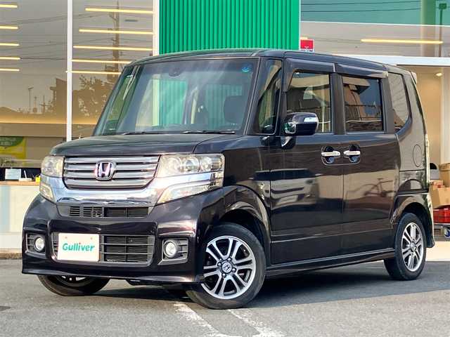 ホンダ Ｎ ＢＯＸ カスタム G SSパッケージ 静岡県 2015(平27)年 6.5万km プレミアムゴールドパープルパール エンジンスタートボタン/パワーステアリング/パワーウィンドウ/保証書/取扱説明書/アイドリングストップ/スマートキー/スペアキー１本/オートエアコン/ETC/SDナビ（CD/ワンセグ）/ベンチシート/フロアマット/両側パワースライドドア/純正アルミホイール/ABS/横滑り防止装置/盗難防止装置/オートライト/W+サイドエアバック/衝突軽減システム/カーテンエアバック