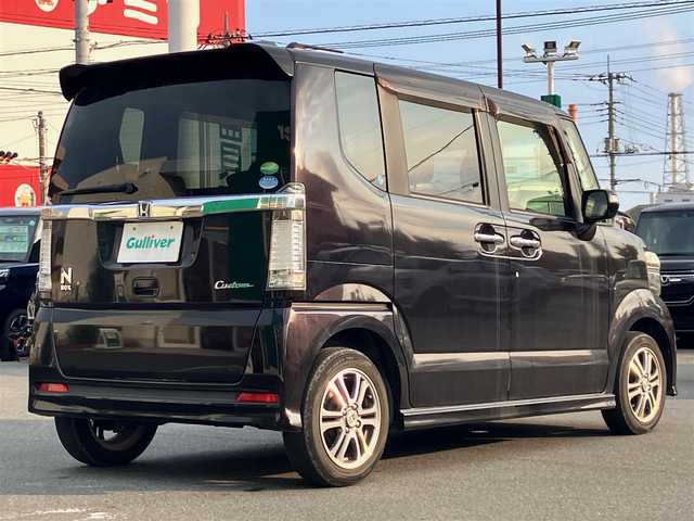ホンダ Ｎ ＢＯＸ カスタム G SSパッケージ 静岡県 2015(平27)年 6.5万km プレミアムゴールドパープルパール エンジンスタートボタン/パワーステアリング/パワーウィンドウ/保証書/取扱説明書/アイドリングストップ/スマートキー/スペアキー１本/オートエアコン/ETC/SDナビ（CD/ワンセグ）/ベンチシート/フロアマット/両側パワースライドドア/純正アルミホイール/ABS/横滑り防止装置/盗難防止装置/オートライト/W+サイドエアバック/衝突軽減システム/カーテンエアバック