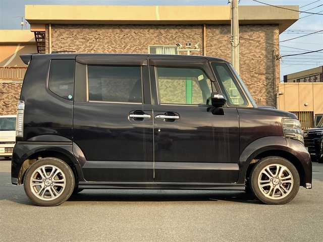 ホンダ Ｎ ＢＯＸ カスタム G SSパッケージ 静岡県 2015(平27)年 6.5万km プレミアムゴールドパープルパール エンジンスタートボタン/パワーステアリング/パワーウィンドウ/保証書/取扱説明書/アイドリングストップ/スマートキー/スペアキー１本/オートエアコン/ETC/SDナビ（CD/ワンセグ）/ベンチシート/フロアマット/両側パワースライドドア/純正アルミホイール/ABS/横滑り防止装置/盗難防止装置/オートライト/W+サイドエアバック/衝突軽減システム/カーテンエアバック