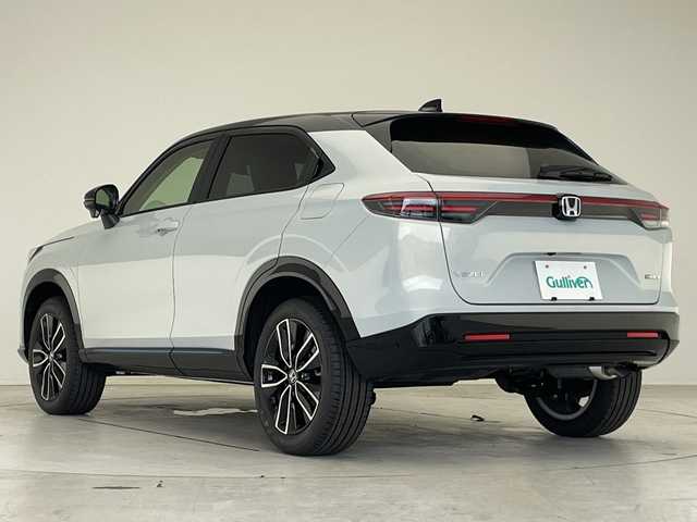 ホンダ ヴェゼル ハイブリッド e:HEV Z PLaYパッケージ 愛知県 2025(令7)年 0.1千km プレミアムサンライトホワイトパール 登録済未使用車/純正9型ディズプレイオーディオナビ/衝突軽減システム/レーダークルーズコントロール/バックカメラ/レーンキープアシスト/シートヒーター/ステアリングヒーター/ブラインドスポットモニター/電動リアゲート/SOSコール/ワイヤレス充電器/パドルシフト/LEDヘッドライト/ハーフレザーシート/ステアリングスイッチ/スマートキー/プッシュスタート/コーナーセンサー/純正アルミホイール