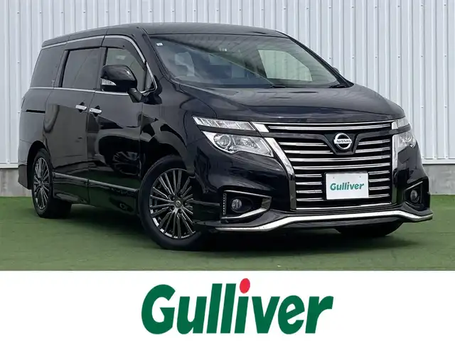 日産 エルグランド 250HWS アーバンクロム 香川県 2017(平29)年 5.7万km ファントムブラック 純正8インチナビ/フリップダウンモニター/両側パワースライドドア/ハーフレザーシート/ウッドコンビステアリング/ステアリングリモコン/レザー調シートカバー/LEDライト/フォグライト/スマートキー/プッシュスタート