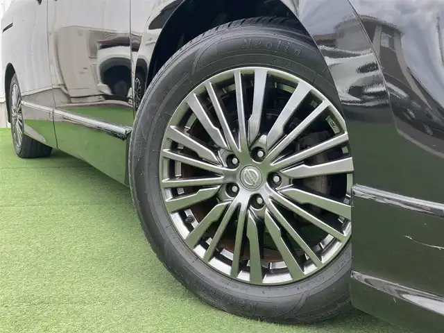 日産 エルグランド 250HWS アーバンクロム 香川県 2017(平29)年 5.7万km ファントムブラック 純正8インチナビ/フリップダウンモニター/両側パワースライドドア/ハーフレザーシート/ウッドコンビステアリング/ステアリングリモコン/レザー調シートカバー/LEDライト/フォグライト/スマートキー/プッシュスタート