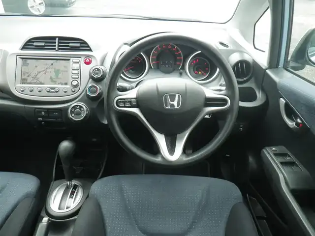 ホンダ フィット G 神奈川県 2009(平21)年 6.5万km シャーベットブルーメタリック 登録時64873km/HDDインターナビ　ワンセグTV/（DVD再生可/Mサーバー）/バックカメラ/ETC/キーレスキー/スペアキー/Fパッケージ/・セキュリティアラーム/・電動格納ミラー/・ウインカーミラー/・運転席ハイトアジャスター/・プライバシーガラス/取説書/保証書/点検記録/　22/3  23/2  23/7  23/10/ 25/9  27/10  29/9/R1/9  R3/9  R5/9