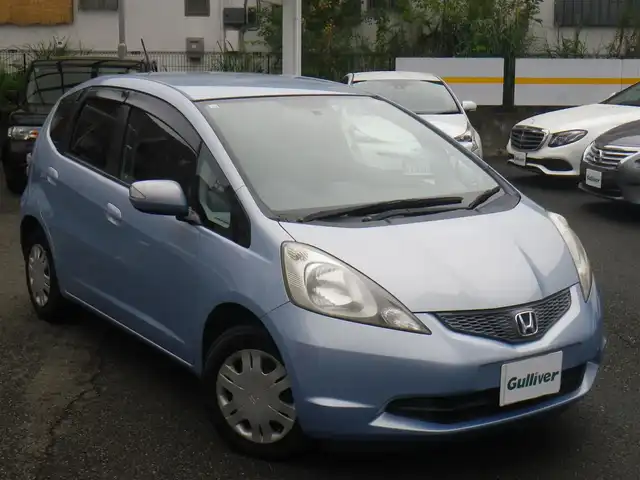 ホンダ フィット G 神奈川県 2009(平21)年 6.5万km シャーベットブルーメタリック 登録時64873km/HDDインターナビ　ワンセグTV/（DVD再生可/Mサーバー）/バックカメラ/ETC/キーレスキー/スペアキー/Fパッケージ/・セキュリティアラーム/・電動格納ミラー/・ウインカーミラー/・運転席ハイトアジャスター/・プライバシーガラス/取説書/保証書/点検記録/　22/3  23/2  23/7  23/10/ 25/9  27/10  29/9/R1/9  R3/9  R5/9