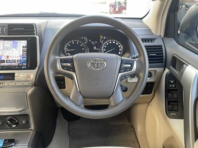 トヨタ ランドクルーザー プラド TX 愛知県 2021(令3)年 4.9万km ホワイトパールクリスタルシャイン ベージュ内装/ルーフレール/社外SDナビ/フルセグTV・CD・DVD・Bluetooth・USB・AM・FM/バックカメラ/プリクラッシュセーフティ/レーダークルーズコントロール/LDA/クリアランスソナー/2.0ビルトインETC/純正17インチアルミホイール/LEDヘッドライト/オートハイビーム/ヘッドライトウォッシャー/スマートキー/プッシュスタート/純正フロアマット/保証書/取扱説明書/スペアスマートキー