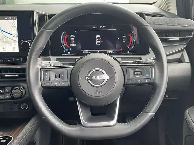 日産 オーラ G レザーエディション 島根県 2024(令6)年 2.4万km バーガンディー 登録時走行距離　23306km/純正ナビ(Bluetooth/AM/FM/USB/HDMI)/フルセグテレビ/BOSEサウンド/全周囲カメラ/プロパイロット/シートヒーター（DN席）/ステアリングヒーター/ステアリングスイッチ/ブラインドスポットモニター/置くだけモバイル充電/オートライト/オートハイビーム/コーナーセンサー/速度標識表示/エマージェンシーブレーキ/レーンキープアシスト/ドライブレコーダー/ETC2.０/純正アルミ１７インチ