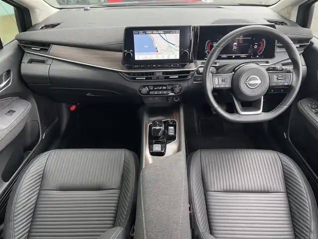 日産 オーラ G レザーエディション 島根県 2024(令6)年 2.4万km バーガンディー 登録時走行距離　23306km/純正ナビ(Bluetooth/AM/FM/USB/HDMI)/フルセグテレビ/BOSEサウンド/全周囲カメラ/プロパイロット/シートヒーター（DN席）/ステアリングヒーター/ステアリングスイッチ/ブラインドスポットモニター/置くだけモバイル充電/オートライト/オートハイビーム/コーナーセンサー/速度標識表示/エマージェンシーブレーキ/レーンキープアシスト/ドライブレコーダー/ETC2.０/純正アルミ１７インチ