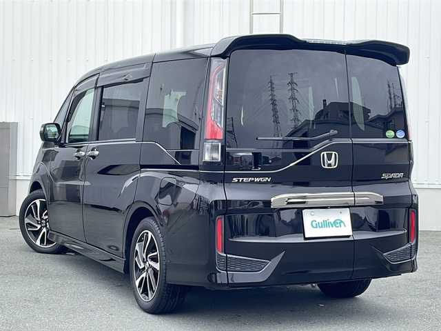 ホンダ ステップワゴン スパーダ クールスピリット 三重県 2016(平28)年 4.5万km プレミアムスパークルブラックパール プッシュスタート/両側パワースライドドア/衝突軽減ブレーキ/レーンキープアシスト/電動格納ミラー/横滑り防止/コーナーセンサー/ビルトインETC/アイドリングストップ/レーダークルーズコントロール/革巻きステアリング/ステアリングスイッチ/オートライト/パドルシフト/前後ドライブレコーダー/シートヒーター(前席)/USB入力端子2か所/HDMI入力端子1ヶ所/ALPINE10型ナビ(AM/FM/CD/DVD/TV/BT)/バックカメラ/ALPINEフリップダウンモニター/ウォークスルー/純正フロアマット/リアサンシェード/禁煙車