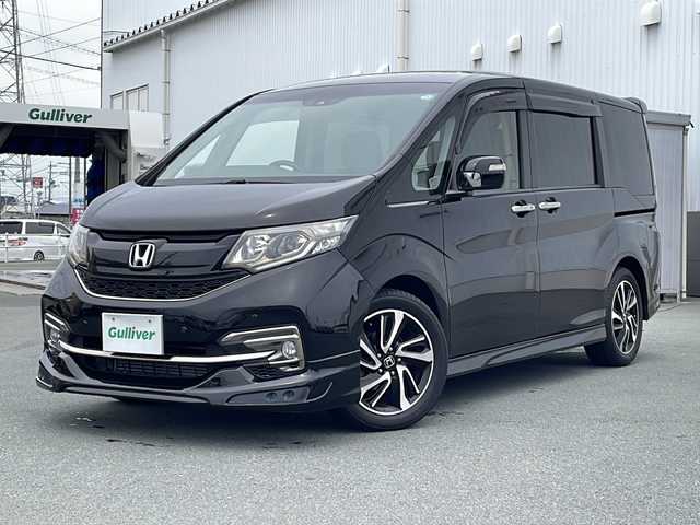 ホンダ ステップワゴン スパーダ クールスピリット 三重県 2016(平28)年 4.5万km プレミアムスパークルブラックパール プッシュスタート/両側パワースライドドア/衝突軽減ブレーキ/レーンキープアシスト/電動格納ミラー/横滑り防止/コーナーセンサー/ビルトインETC/アイドリングストップ/レーダークルーズコントロール/革巻きステアリング/ステアリングスイッチ/オートライト/パドルシフト/前後ドライブレコーダー/シートヒーター(前席)/USB入力端子2か所/HDMI入力端子1ヶ所/ALPINE10型ナビ(AM/FM/CD/DVD/TV/BT)/バックカメラ/ALPINEフリップダウンモニター/ウォークスルー/純正フロアマット/リアサンシェード/禁煙車