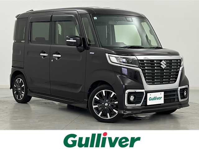 スズキ スペーシア カスタム HYBRID XS 宮城県 2019(平31)年 6.6万km ムーンライトバイオレットPM 禁煙車/1オーナー/スズキセーフティサポート/・車線逸脱抑制制御機能/・車線逸脱警報機能/・パーキングソナー/・横滑り防止装置/・ハイビームアシスト/デュアルカメラブレーキサポート	/ストラーダナビ/・BT.CD.DVD.SD/フルセグTV/両側パワースライドドア/ハーフレザーシート/運転席シートヒーター/LEDヘッドライト/フォグランプ/アイドリングストップ/プッシュスタート/スマートキー/ステアリングスイッチ/サーキュレーター/純正15inAW/純正フロアマット/ロールサンシェード/シートバックテーブル