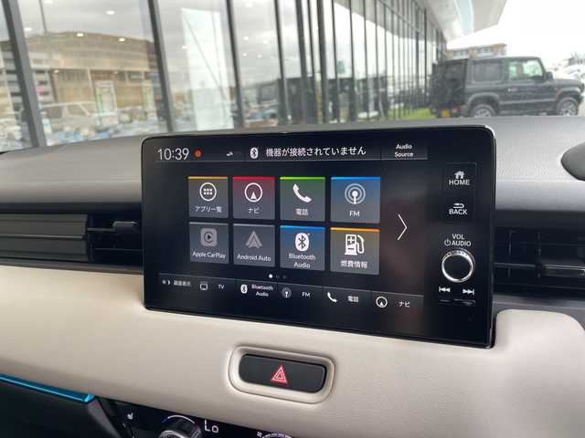 ホンダ ヴェゼル ハイブリッド e:HEV Z PLaYパッケージ 愛知県 2025(令7)年 0.1千km プレミアムサンライトホワイトパール 登録済未使用車/純正9型ディズプレイオーディオナビ/レーダークルーズコントロール/バックカメラ/レーンキープアシスト/シートヒーター/衝突軽減システム/ステアリングヒーター/ブラインドスポットモニター/電動リアゲート/SOSコール/ワイヤレス充電器/パドルシフト/LEDヘッドライト/ハーフレザーシート/ステアリングスイッチ/スマートキー/プッシュスタート/コーナーセンサー/純正アルミホイール