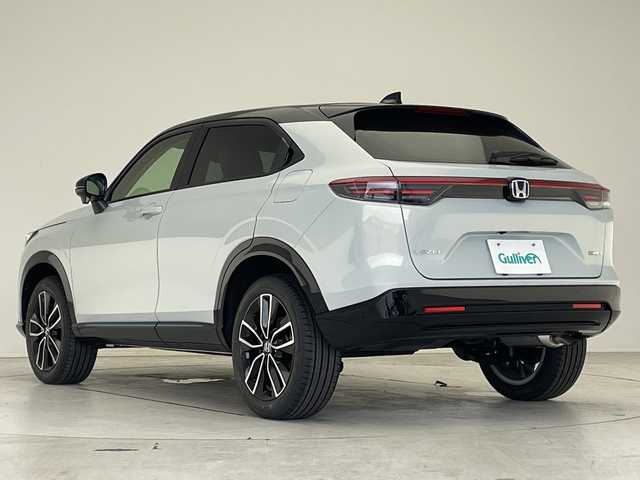 ホンダ ヴェゼル ハイブリッド e:HEV Z PLaYパッケージ 愛知県 2025(令7)年 0.1千km プレミアムサンライトホワイトパール 登録済未使用車/純正9型ディズプレイオーディオナビ/レーダークルーズコントロール/バックカメラ/レーンキープアシスト/シートヒーター/衝突軽減システム/ステアリングヒーター/ブラインドスポットモニター/電動リアゲート/SOSコール/ワイヤレス充電器/パドルシフト/LEDヘッドライト/ハーフレザーシート/ステアリングスイッチ/スマートキー/プッシュスタート/コーナーセンサー/純正アルミホイール