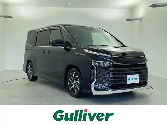 トヨタ ヴォクシー S－Z 福井県 2022(令4)年 4万km アティチュードブラックマイカ 純正メモリナビ/（AM/FM/Bluetooth/フルセグTV)/バックカメラ/プリクラッシュ/コーナーセンサー/追従クルコン/ビルトインETC2.0/シートヒーター/ハーフレザーシート/両側パワースライドドア/オートブレーキ/オートライト/LEDヘッドライト/純正17インチアルミホイール/社外フロアマット