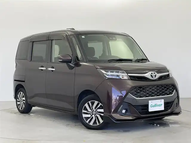 トヨタ タンク カスタムG 富山県 2018(平30)年 3.2万km プラムブラウンパールクリスタルシャイン 純正ナビ（AM/FM/DVD/BT/フルセグ）/バックカメラ/ETC/両側パワースライドドア/シートヒーター/衝突被害軽減システム/クルーズコントロール/レーンキープアシスト/コーナーセンサー/横滑り防止装置/アイドリングストップ/オートLEDライト/オートマチックハイビーム/純正アルミホイール/純正フロアマット/革巻きステアリング/ステアリングスイッチ/スマートキー/スペアキー