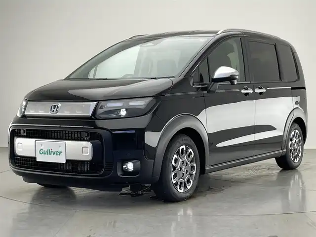ホンダ フリード ハイブリット e:HEV クロスター 愛知県 2025(令7)年 0.1千km クリスタルブラックパール 純正９インチディスプレイオーディオ/ホンダセンシング/ブラインドスポットモニター/両側パワースライドドア/バックカメラ/LEDオートライト/フォグランプ/レーダークルーズコントロール/フルセグTV/シートヒーター/ハーフレザーシート/コーナーセンサー/純正アルミホイール/衝突被害軽減ブレーキ/禁煙車