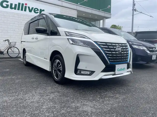 日産 セレナ e－パワー ハイウェイスター V 神奈川県 2021(令3)年 1万km ブリリアントホワイトパール 2トーン 法人１オーナー/運転支援機能/・プロパイロット/・エマージェンシーブレーキ/・踏み間違い防止アシスト/・ブラインドスポットアシスト/・車線逸脱防止支援システム/・後退時車両検知警報/・ハイビームアシスト/両側電動ハンズフリースライドドア/純正ナビ（Mj320D-W）/・Bluetooth/DVD/・フルセグTV/・インテリジェントアラウンドビューモニター/前後ドライブレコーダー/純正フロアマット/ドアバイザー/スマートキーX2/ETC/新車時手帳、取説