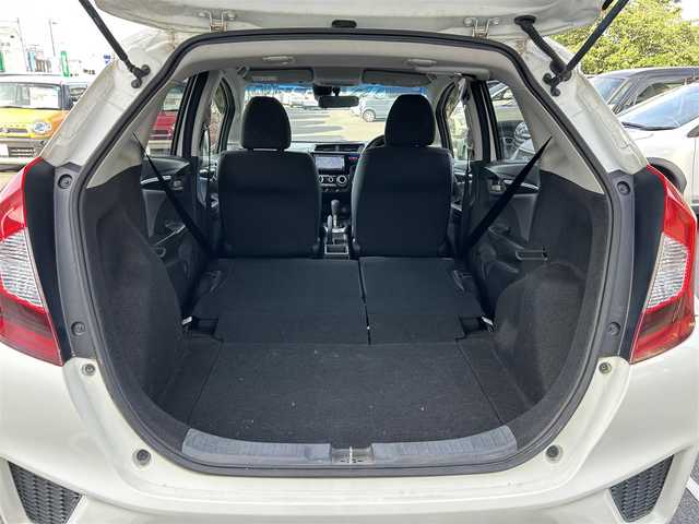 ホンダ フィット 13G Fパッケージ 静岡県 2013(平25)年 7.9万km プレミアムホワイトパール 純正ナビ/（AM/FM/CD）/バックカメラ /スマートキー/プッシュスタート/純正フロアマット/ETC/取り扱い説明書