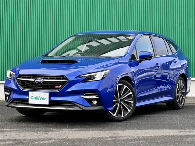 スバル レヴォーグ 1．8STIスポーツ EX 宮城県 2021(令3)年 3.4万km WRブルーパール アイサイトXテクノロジー/・渋滞時ハンズオフ/・渋滞時発進アシスト/・アクティブレーンチェンジアシスト/・ドライバー異常時対応/・カーブ前抑制機能/・料金所前速度制限/アイサイトコアテクノロジー/・プリクラッシュブレーキ/・AT誤発進抑制機能/・追従機能付きクルーズコントロール/・ツーリングアシスト/・車線逸脱抑制/アイサイトセイフティプラス/・運転支援テクノロジー/・視界拡張テクノロジー/4WD/STI12.3インチフル液晶メーター/純正11.6インチディスプレイナビ/・Bluetooth/・Apple CarPlay/Android Auto/・地デジTV/フロント/サイド/バックカメラ/サイドシルスポイラー/リアスポイラー/STIロゴ入り大型マフラーカッター/STIブラックツートンレザーシート/全席シートヒーター/左右独立温度調整フルオートエアコン/ハンズフリーバックドア/ステアリング連動フルLEDヘッドランプ/コムテック前後ドライブレコーダー/STIロゴ入ステアリング/STIロゴ入り高触感革巻きステアリング/STIロゴ入りフロアマット/保証書